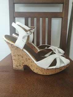 These are such lovely Chinese Laundry wedge sandals ! Made of real leather and cork. Pre-owned, used few times.  Great find for summer! Insole length:approx. 27 cm Heel height: 13 cm Platform: 3 cm I expect payment to be done within 48h. I will ship immediately after payment cleared. Buyer is responsible for possible governmental fees in his/her country. All sales are final. Thank you for shopping with me:) White Cork Open Toe Sandals, White Cork Sandals For Summer, White Cork Sandals For Spring, White High Heel Wedge Sandals With Wooden Heel, White Open Toe Wedge Sandals With Wooden Heel, White Wedge Sandals With Wooden Heel And Round Toe, White Wedge Sandals With Wooden Heel, White Leather Wedge Sandals With Wooden Heel, White Wedge Heel Sandals With Wooden Heel