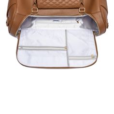 Travel in style with our all-new Monaco Travel Bag! Designed in Los Angeles, the Monaco Travel Bag is crafted with premium faux vegan leather and also features a distinctive quilted texture front pouch with classic gold enameling like our signature Monaco Diaper Bag and Snack Bags. Monaco Travel, Plus Fours, Shoe Storage Shelf, Caramel Brown, Travel In Style, Snack Bags, Classic Gold, Gold Enamel, Fireplace Accessories