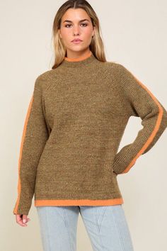 This cozy masterpiece offers relaxed vibes with its raglan sleeves, plus a snug funnel neck and a side slit for stylish movement. We added subtle orange stripes for a colorful punch, plus top-notch materials for softness, warmth, and comfort. Dress it down with jeans and leggings or amp up the look with a skirt and boots Fabric Contents: 74% Polyester, 15% Nylon, 6% Wool, 5% Spandex Care Instructions: Machine wash cold, gentle cycle, tumble dry low. Size Measurement (inch): S: 22.5 (Bust), 26.0 Winter Wishlist, Raglan Sleeve Sweater, Soft Orange, Raglan Sweater, Funnel Neck Sweater, Sweater Fits, Orange Fabric, Warm Sweaters, Brown Sweater