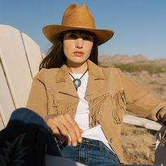 An iconic statement piece, this suede jacket made from high-grade leather features layers of fringe and Western details like stylized front patch pockets and a notched collar. Supple leather and quality craftsmanship will make this Western classic a closet go-to for years to come. Fully-Lined Notch Collar Straight Front Yokes with Fringe Single Point Back Yoke Front Patch Pockets With Fringe Fringed Sleeves and Bottom Hem Leather Imported Cowboy Jacket Outfit, Cowboy Jacket, Outdoor Girls, Suede Fringe Jacket, Denim Outerwear, Fringe Jacket, Notch Collar, Light Tan, Country Girl