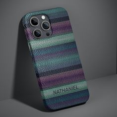 an iphone case with the name nathan on it in purple, green and blue stripes