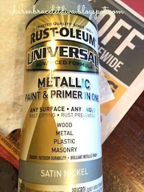 a can of rust - oleeum universal metallic paint and primer on a table