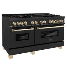 a black stove with two ovens and gold knobs on the front, against a white background