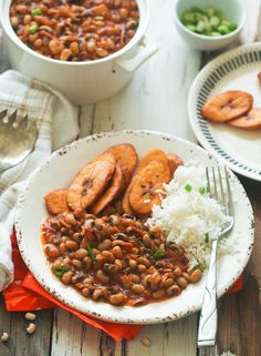 a white plate topped with beans and rice