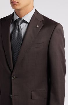 Italian wool styled in a deep, rich burgundy smartens a suit crafted for year-round versatility with traditional notched lapels and tapered flat-front trousers. Top= 28 1/2"; bottom= 36 1/2" inseam; 14 1/2" leg opening; 10" front rise; 16" back rise (size 42) Jacket has notched lapels; chest pocket; flap pockets; side vents Trousers have zip fly with hook-and-bar closure; slant pockets; back button-welt pockets Jacket is lined Unhemmed 100% wool Dry clean Imported Elegant Brown Suits With Concealed Placket, Elegant Brown Blazer With Welt Pockets, Timeless Brown Notch Lapel Suit, Timeless Brown Business Suit, Elegant Brown Flat Front Suits, Timeless Brown Semi-formal Suits, Timeless Semi-formal Brown Suit, Formal Brown Suit With Welt Pockets, Tailored Brown Three-piece Suit For Formal Occasions