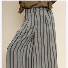 Striped High Waist Wide Leg Pant With Pockets 100% Polyester Machine Wash Striped Spring Bottoms With Pockets, Spring Striped Bottoms With Pockets, Casual Striped Ankle-length Pants, Casual Striped Bottoms For Fall, Casual Striped High-waisted Pants, Casual Striped Wide-leg Pants, Casual Wide-leg Striped Pants, Striped Wide Leg Bottoms With Relaxed Fit, Striped Ankle-length Pants For Spring