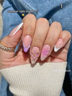 a woman's hand with pink and white nails