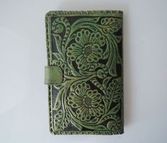 "GREEN PASSPORT WALLET, Tooled Leather Purse, Green Biker Wallet, Full Leather Lining, Vintage Style, Hand Painted Leather, Bifold Wallet. TRAVEL WALLET GREEN / Beautifully Hand Tooled Women's Wallet, Leather Clutch. Stunning Hand Tooled, Hand Crafted in Romantic Floral Swirls. Hand painted leather. Eco Friendly leather, vegetable tanned leather. No 2 pieces will ever be exactly alike. Our dedicated artisan hails from a large family of artists, so each piece is a memorable piece of art. Cotton D Vintage Green Wallets With Card Slots, Green Travel Wallets With Card Slots, Green Wallets With Card Slots For Daily Use, Green Rectangular Wallet For Everyday Use, Green Wallets With Card Slots, Green Daily Use Wallet With Card Slots, Green Rectangular Wallets For Daily Use, Green Rectangular Wallets With Card Slots, Green Bifold Wallet For Everyday Use