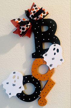 the letter b is decorated with halloween decorations