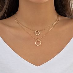 Description:Dainty Layered Metallic Halo Pendant Chain Necklace SetSpecification:Size: 13.8" - 15.7" Weight: 0.36 oz/setMaterial: copperColors: gold/silverFeatures and Details:This layered halo pendant choker necklace set is made of nickel-free. lead-free. cadmium-free and hypoallergenic materials. which will not turn your skin green or cause anaphylactic reaction.This gift for her chain necklace set is decorated with unique design and superb craftsmanship to create special piece that can satisf Rose Gold Metal Snake Chain Necklace, Gold Layered Necklace With Delicate Chain, Trendy Gold Chain Necklace With Round Pendant, Gold-tone Layered Clavicle Chain Necklace, Gold-tone Metal Layered Necklace With Clavicle Chain, Metal Layered Necklace With Round Pendant, Metal Layered Necklace With Delicate Chain And Round Pendant, Layered Necklace With Delicate Chain And Round Pendant, Delicate Metal Layered Necklace With Round Pendant