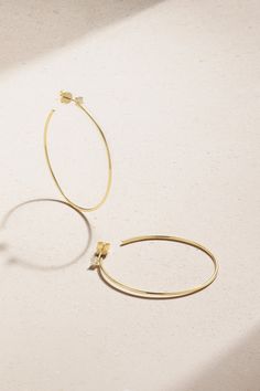 Los Angeles-based fine jeweler Anita Ko creates elegant, minimalist pieces you'll turn to on repeat for years to come. These 18-karat gold earrings are sculpted into oversized hoops and topped with two glistening diamond studs totaling 0.27-carats. Elegant Gold Hoop Earrings In Recycled Gold, Minimalist Hoop Earrings With Prong Setting For Formal Occasion, Minimalist Hoop Earrings With Prong Setting For Formal Events, Minimalist Formal Hoop Earrings With Prong Setting, Minimalist Hoop Earrings For Formal Events, Dainty Yellow Gold Hoop Earrings With Polished Finish, Everyday Elegant Round Hoop Earrings, Gold-toned Sterling Silver Hoop Earrings For Everyday Elegance, Gold Sterling Silver Hoop Earrings For Everyday Elegance