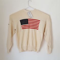 Vintage 90s American Airlines - Avis Car Rental - Knit Sweater w/ American Flag Men's XL Extra Large Made in USA Brand New with Tags FREE SHIPPING MEASUREMENTS:  Chest is 24 inches across from pit to pit.  Length from shoulder to bottom is 28 inches.  Length of arm from shoulder seam to cuff end is 23 1/2 inches. Casual Cream Crew Neck Polo Sweater, Vintage Knitted Cotton Tops, 90s Crew Sweater For Winter, 90s Crew Neck Winter Sweater, Vintage Cotton Polo Sweater With Crew Neck, Vintage Cotton Crew Neck Polo Sweater, Retro Crew Neck Cream Sweater, Retro Cream Crew Neck Sweater, Vintage Cotton Polo Sweater For Fall