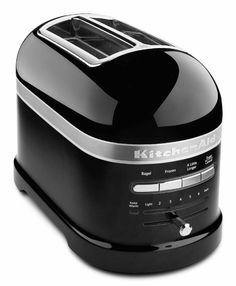 a black toaster sitting on top of a counter