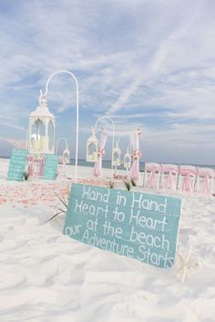 a sign on the beach that says hand in hand heart to heart at the beach our adventure starts