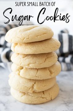 a stack of sugar cookies sitting on top of a counter