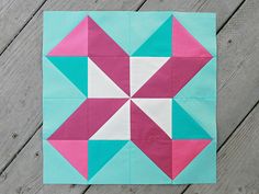 the block is made up of pink and blue squares