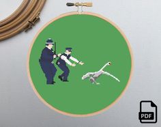 a cross - stitch picture of a man and a dog on a green background with text