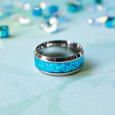 Tungsten Carbide Opal Inlay Ring *Material: Metal *Metals Type: Tungsten *Color: Silver & Blue Opal *Size: 7 *Thickness: 2.3mm To 2.5mm *Surface Width: 8mm *Gender: Men *Style: Classic *New Without Tag ***Open To Offers! Turquoise White Opal Ring Men, Blue Sterling Silver Opal Ring With Polished Finish, Nickel-free Blue Opal Jewelry, Nickel-free Blue Turquoise Sterling Silver Ring, Spiritual Nickel-free Blue Turquoise Ring, Mens Accessories Jewelry, Tungsten Carbide, Style Classic, Ring Size 7