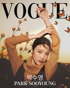 a woman is posing on the cover of a magazine with butterflies flying over her head