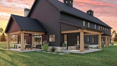 this is an artist's rendering of a black house with porches and covered patio