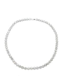 Highest quality, crystal clear cubic zirconia stones in a halo setting, set in a sterling silver tennis necklace that will stun with its sparkle and clarity. Truly a spectacular piece, for a special occasion! 17" long, comprised of a total of 912 stones. Interior setting stones are 4mm in diameter. Safety clasp. Imported by Italian Ice Italian Ice, Expensive Jewelry Luxury, Halo Setting, Jewelry Luxury, Expensive Jewelry, Tennis Necklace, Glasses Sunglasses, Neck Lace, Bling Bling