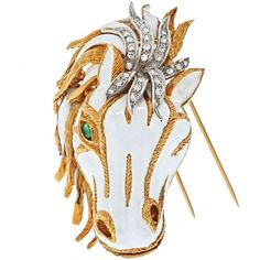 Capture the essence of elegance and boldness with the David Webb Platinum & 18K Yellow Gold White Enamel Diamond Horse Face Brooch. This stunning piece is a true masterpiece, exuding an air of sophistication and artistry. The intricate horse head design, adorned with captivating white enamel, is a testament to the brand's impeccable craftsmanship.The brooch features a mesmerizing emerald eye that adds a touch of allure to the piece. Surrounding the eye are 34 exquisite round diamonds, glistening Luxury White Hallmarked Brooch, Luxury Hallmarked White Brooches, Exquisite White Brooch For Formal Occasions, Luxury White Brooch For Gift, Luxury White Brooches For Gifts, Luxury White Brooches As Gift, Luxury White Gold Brooches Collectible, Luxury White Gold Collectible Brooch, Luxury White Gold Collectible Brooches