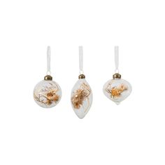 three glass ornaments with gold and white designs