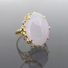 Vintage 18K Solid Yellow Gold Translucent Oval Natural Light Lavender Jadeite Jade Ring....Marked 18k ...Total of weights 4.9grams...Size 7.25..Measure of Jade 18 x 13MMIt's in very good condition.  #461958 Lavender Jade Jewelry, Elegant Pink Opal Ring For Formal Occasions, Formal Oval Kunzite Rings, Oval Amethyst Gemstone Ring, Pink Oval Moonstone Ring, Formal Pink Oval Opal Ring, Fine Jewelry Oval Kunzite Rings, Pink Oval Cabochon Opal Ring, Oval Kunzite Ring For Anniversary