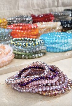 Set of 9 shimmering faceted glass bead stretch bracelet Glass bead Nickel/Lead Compliant APPROX. Diameter 3" Marketing Clothing, Bead Stretch Bracelets, Bracelet Diy, Clothing Retail, Beaded Bracelets Diy, Selling Clothes, Beaded Stretch Bracelet, Faceted Glass, Bead Bracelet