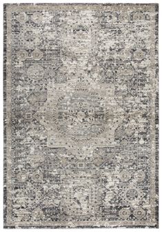 an area rug with grey and white colors