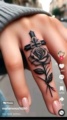 a woman's hand with a cross and rose tattoo on it, next to an instagram page