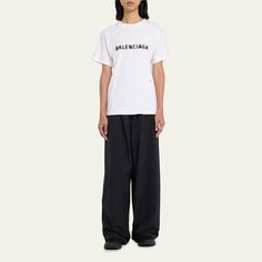 Balenciaga wide-leg tracksuit pants High rise; elastic waist  Side slip pockets Logo embroidery at the hip  Full length Relaxed fit  Cotton/nylon/polyamide Made in Italy Tracksuit Pants, Logo Embroidery, Embroidery Logo, Balenciaga, Elastic Waist, Full Length, Tops Designs, Wide Leg, High Rise