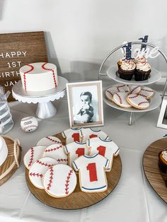 Baseball themed birthday party with baseball cake and cookies. Rookie Of The Year First Birthday, Baseball Themed First Birthday, Rookie Year First Birthday, Boys First Birthday Party Ideas, Boys 1st Birthday Party Ideas, Themed First Birthday