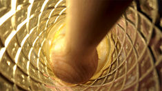 a close up of a person's foot in a glass bowl filled with liquid