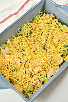 a casserole dish with broccoli and cheese