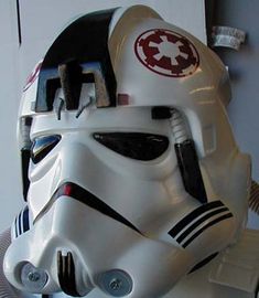 a star wars helmet on display in a room