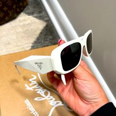 Prada White Sunglasses Like New Worn 1 Time. Fully Cleaned No Scratches. Can’t Find Box But Will Put In Another Designer Sunglass Case For Shipping. Prada Accessories, White Sunglasses, Colored Sunglasses, Sunglasses Accessories, Sunglasses Case, Prada, Color White, Like New, Women Accessories