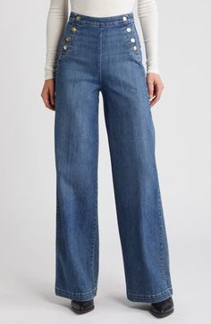 The classic maritime silhouette of these wide-leg jeans is given a modern update with a curve-accentuating high waist and brassy side snaps. The comfort stretch denim features a faded wash and is cut for a Parisian fit with clean lines. 35" inseam; 24" leg opening; 13" front rise; 15 1/2" back rise (size 29) Side zip closure Front snap pockets; back patch pockets 90% cotton, 6% elastomultiester, 4% elastane Machine wash, dry flat Imported Sailor Jeans, White Wide Leg Jeans, Cut Out Jeans, Sailor Jean, High Waist Wide Leg Jeans, Black Wide Leg Pants, Patterned Jeans, Cut Jeans, Vintage Jeans