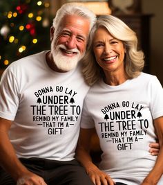 Looking for a hilarious and unique Christmas gift? Look no further! This funny t-shirt by Bella + Canva is perfect for anyone who loves to bring laughter and joy to the holiday season.  Featuring a playful design, this t-shirt showcases a humorous message: Lay down under the Christmas tree to remind my family that I am a gift. It's a great way to add some humor and light-heartedness to your family gatherings and celebrations. Made from high-quality fabric, this t-shirt is comfortable to wear and will become a favorite in your wardrobe. Whether you're attending a Christmas party or simply lounging around at home, this shirt is sure to bring smiles and laughter to everyone around you. This t-shirt is not only a fun and unique gift idea, but it's also a great way to express your sense of humo Christmas Humor Tshirts, Funny Christmas Gifts, Funny Christmas Shirts, Face Light, Unique Christmas Gifts, Playful Design, Christmas Humor, Christmas Shirts, Funny Tshirts