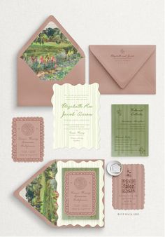 the wedding stationery is set up with pink envelopes, green and white paper