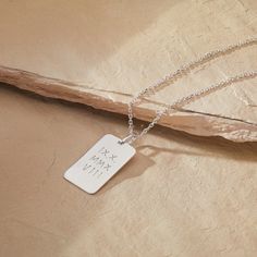 A timeless and classic design for the man in your life, our Personalized Dog Tag Necklace is hand-engraved with the words that means the most.925 Sterling SilverDog Tag charm: 1.2x0.8Chain Length: 23.6Hand engraved in our Paris workshopSent with love in a complimentary gift boxAny slight variations in lettering depth, spacing and alignment from the examples shown are part of the aesthetic and originality of the piece Spiritual Engraved Sterling Silver Necklace, Spiritual Sterling Silver Necklace With Engraving, Spiritual Sterling Silver Engraved Necklace, Engraved White Gold Custom Nameplate Necklace, Sterling Silver Stamped Necklace With Rectangular Pendant, Everyday Dog Tag Necklace For Father's Day, Minimalist Personalized Dog Tag Jewelry, Classic Engraved Charm Necklaces For Everyday, Engraved Square Pendant Charm Necklace For Everyday