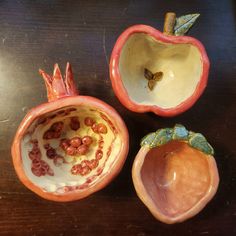 an apple and some other fruit on a table