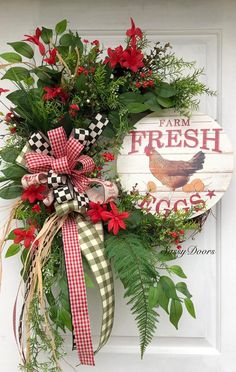 a wreath is hanging on the front door