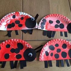 three paper plates with ladybugs painted on them