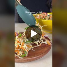 a person cutting up food on top of a wooden plate