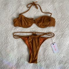 Tropicana 2021 Set Size 1 Suede Material Measurements On Photos. Bottoms Are Nwt Top Is In Excellent Condition Underwire Bust: 24-25 Inches Waist: 24 Inches Any Questions Let Me Know :) Offers Are Welcome :) Adjustable Orange Beachwear Swimwear, Adjustable Orange Swimwear For Pool, Brown Swimwear For Summer, Brown Swimwear For Sunbathing In Summer, Brown Halter Neck Swimwear For Summer, Brown Tie-side Bottom Swimwear For Summer, Brown Beachy Swimwear For Beach Season, Summer Brown Halter Neck Swimwear, Beachy Brown Swimwear For Beach Party