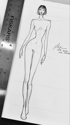 a pencil drawing of a female figure next to a ruler