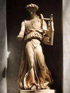 a statue of lady justice holding the scales