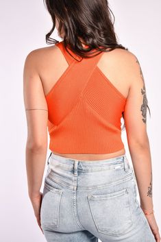 This Cross Neck Crop Top is a trendsetter's must-have. Its ribbed material and fitted design make it a stylish addition to your wardrobe, and its cross over halter adds a fashionable edge. Available in a range of lively festival colors, you'll be turning heads in no time. Fitted Orange Ribbed Top, Orange Ribbed Tops For Spring, Cross Neck, Small Crop Tops, Neck Crop Top, Knit Crop Top, Fashion Fits, Quality Clothing, Trend Setter