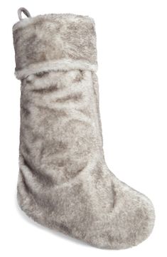 Made from plush faux fur with a frosted look, this stocking adds rich depth and dimension to your holiday decorations. 19" x 12" 100% recycled polyester faux fur Machine wash, tumble dry Imported Recycled Content Standard 100/Global Recycled Standard Blended: made with 100% recycled polyester This product meets Nordstrom Preferred Materials criteria: contains at least 30% more-sustainably sourced materials Pearl Grey, Holiday Decorations, Faux Fur, Recycling, Stockings, Nordstrom, Holiday Decor, Grey